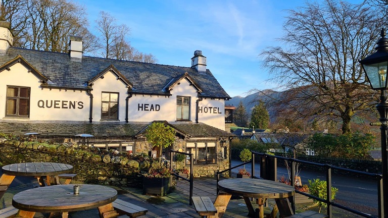 Outside of the Queen's Head, a dog-friendly pub in the Lake District National Park